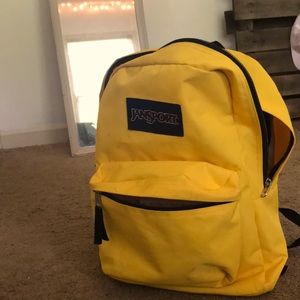 yellow jansport backpack. :)